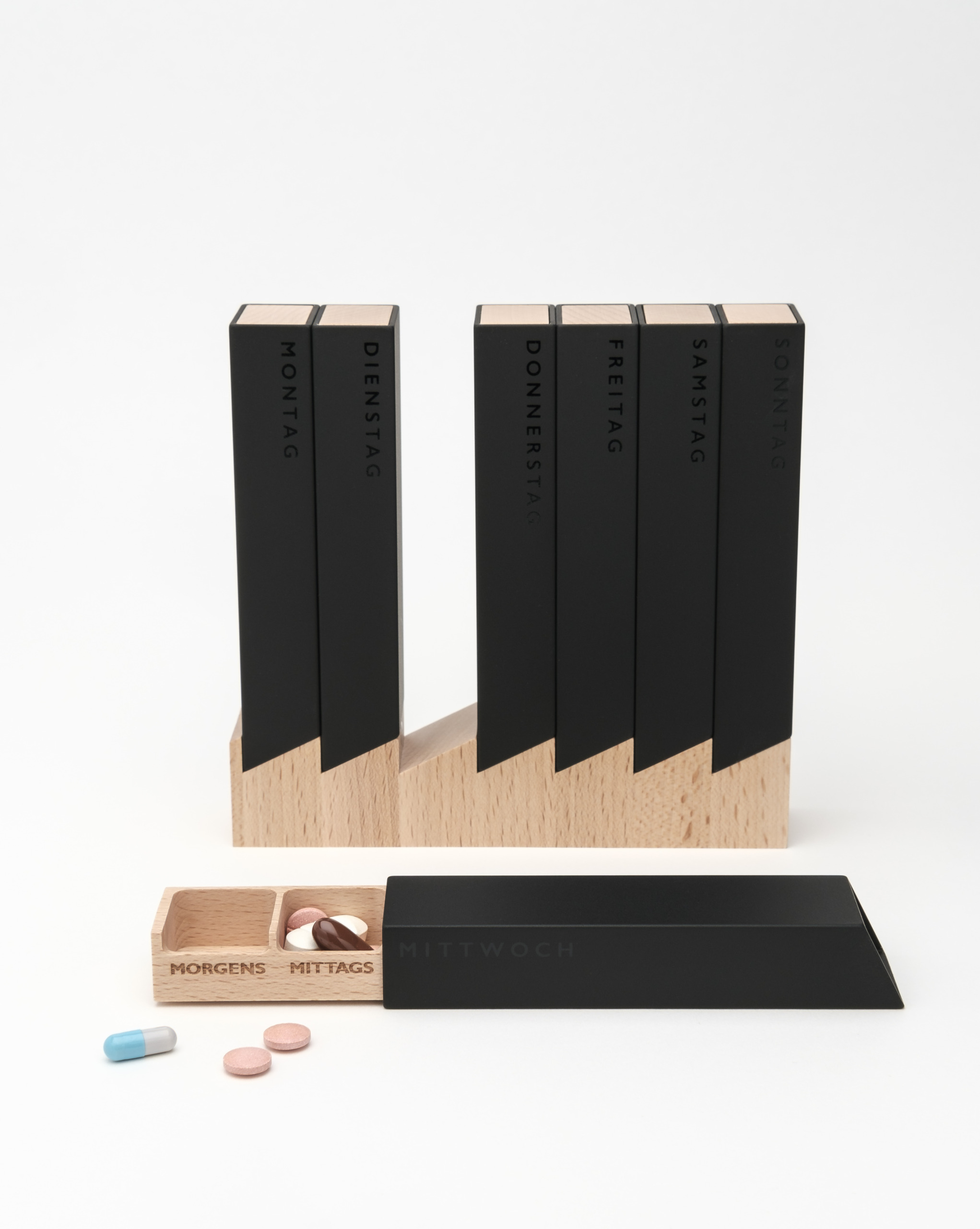 Monolith 4 Pillendose Woche Schwarz, Buche